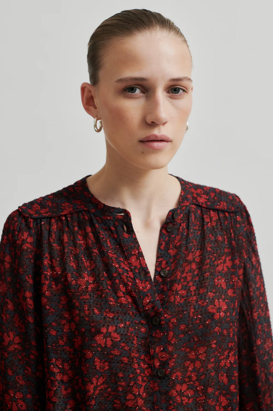 Loose fitting semi sheer shirt with pattern. Red and Black tonal. 