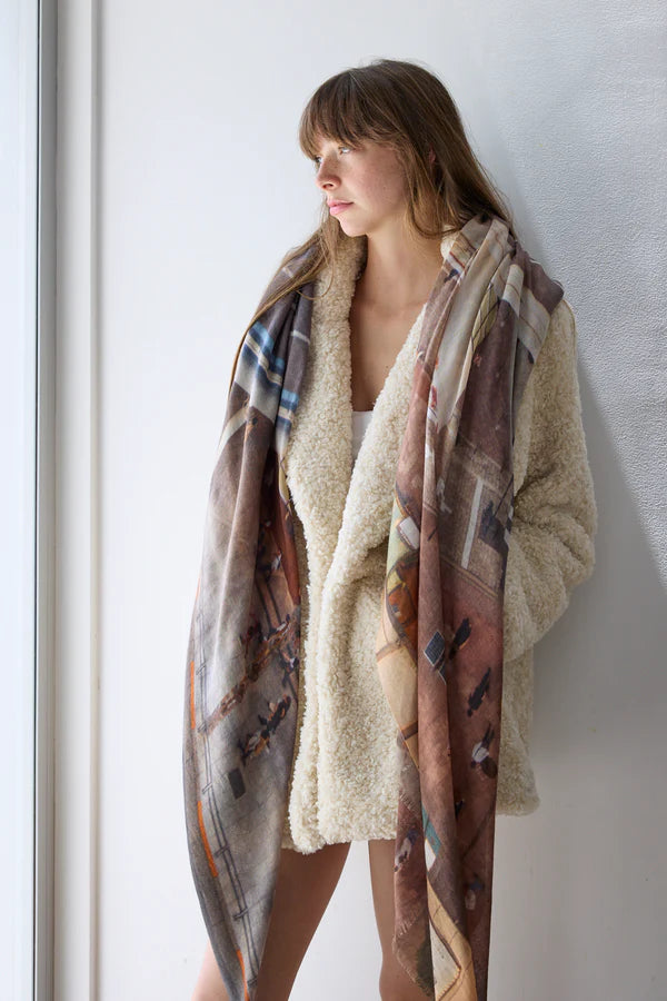 Oversize wool scarf in soft pastel and brown tone pattern. 