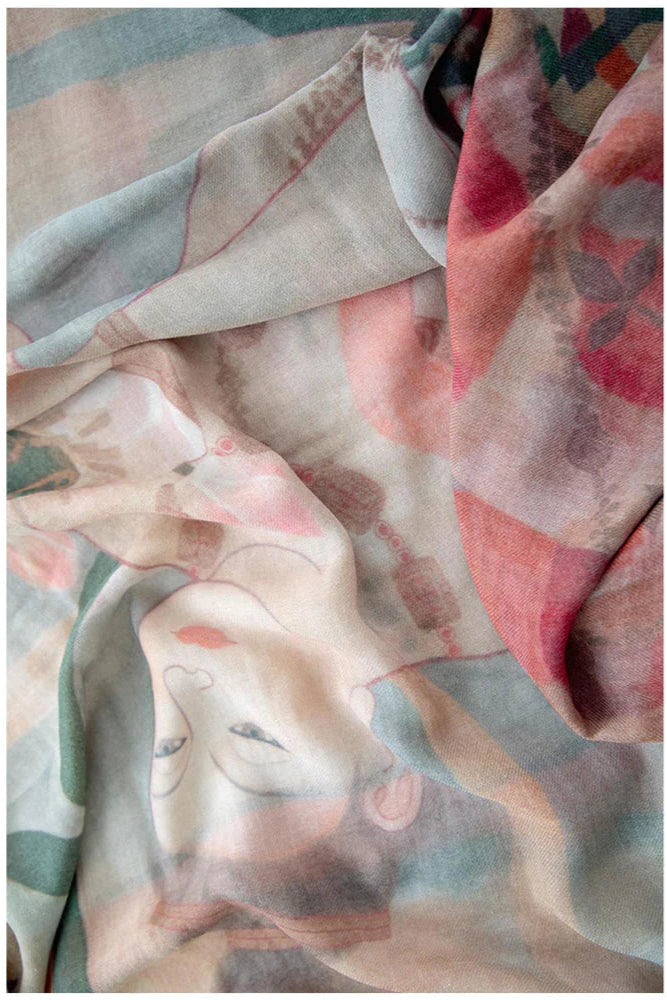 Colourful wool scarf in pink and purple tones with pattern 