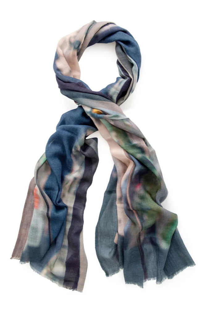 Wool Scarf mulitcoloured with blues, greens, oranges and yellow.  Flat lay. 