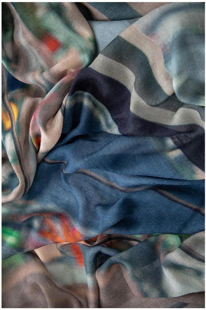 Wool Scarf mulitcoloured with blues, greens, oranges and yellow. 