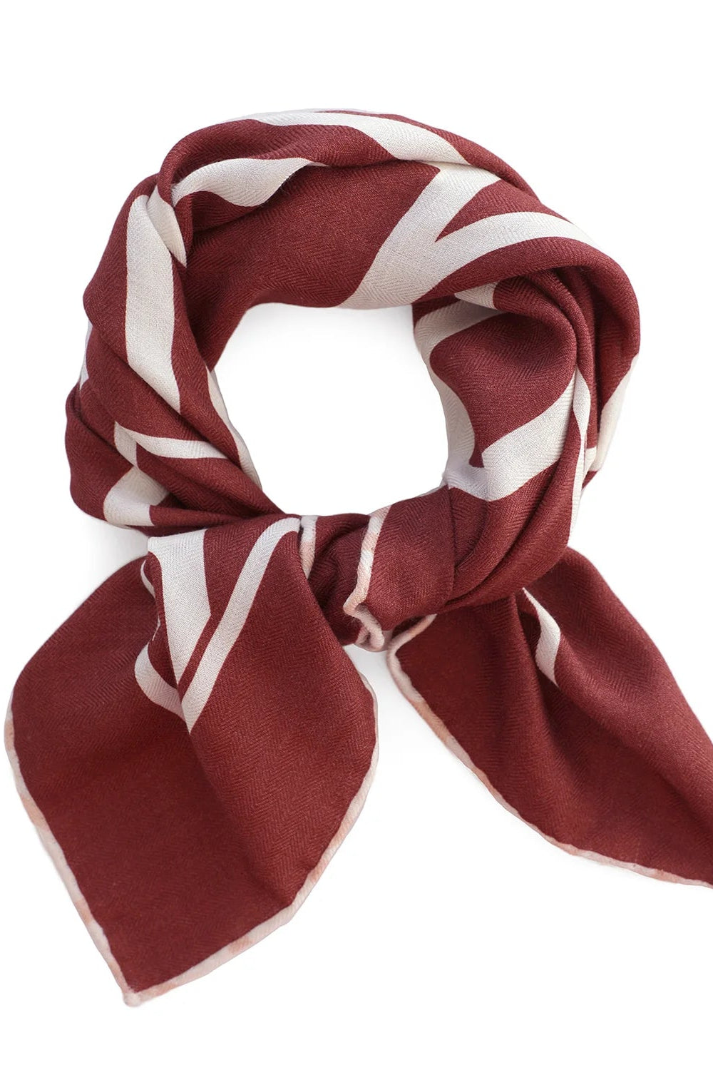 Pinot red scarf with white geometric pattern on a white background