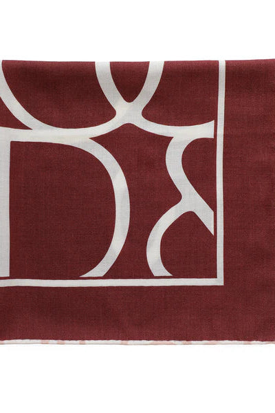 Red square with white geometric pattern on a white background