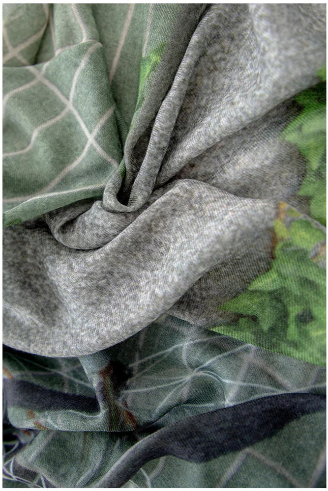 Wool scarf in grey and green tones. 