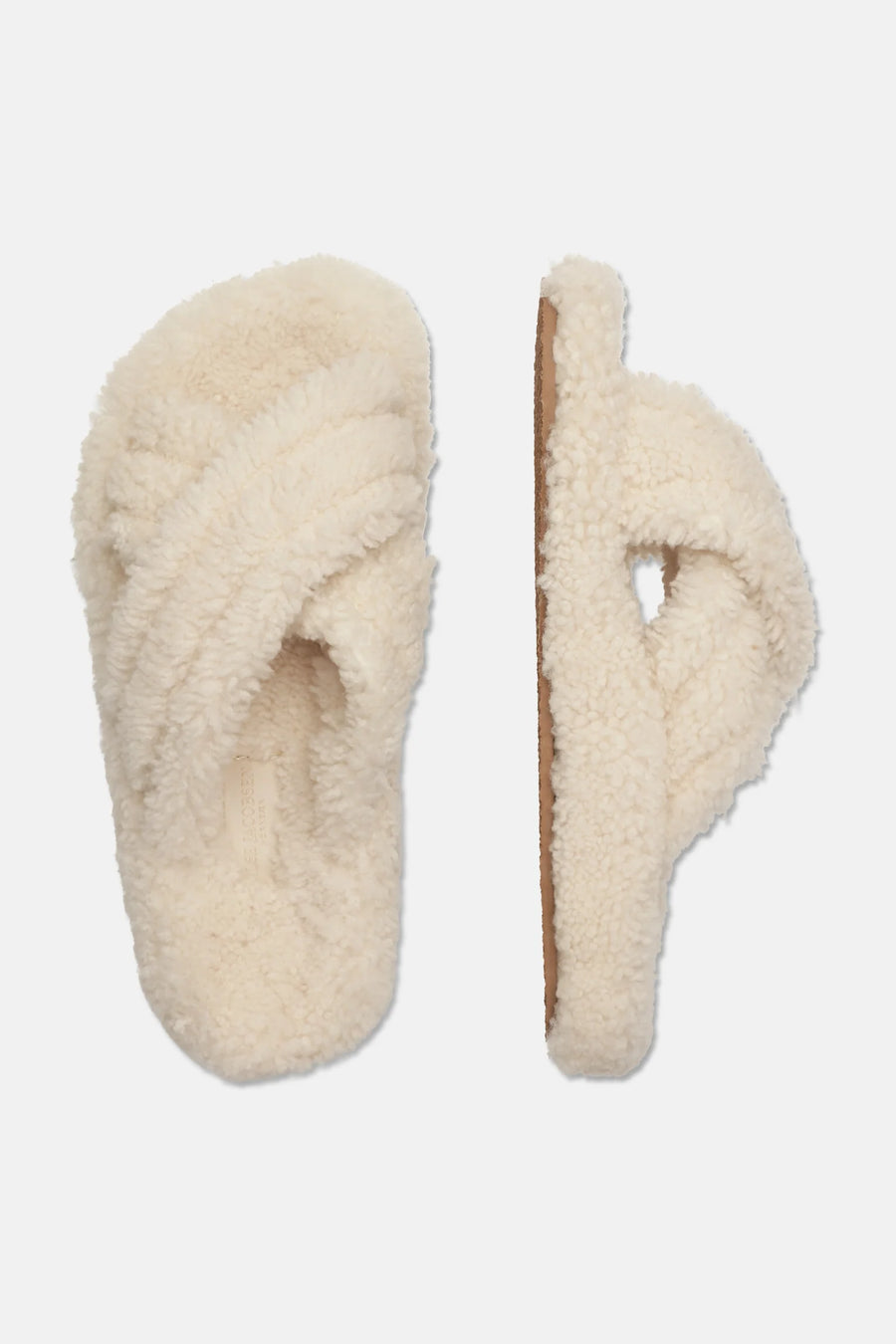 Open toe sheepskin slipper with cross over front in cream colourway. 