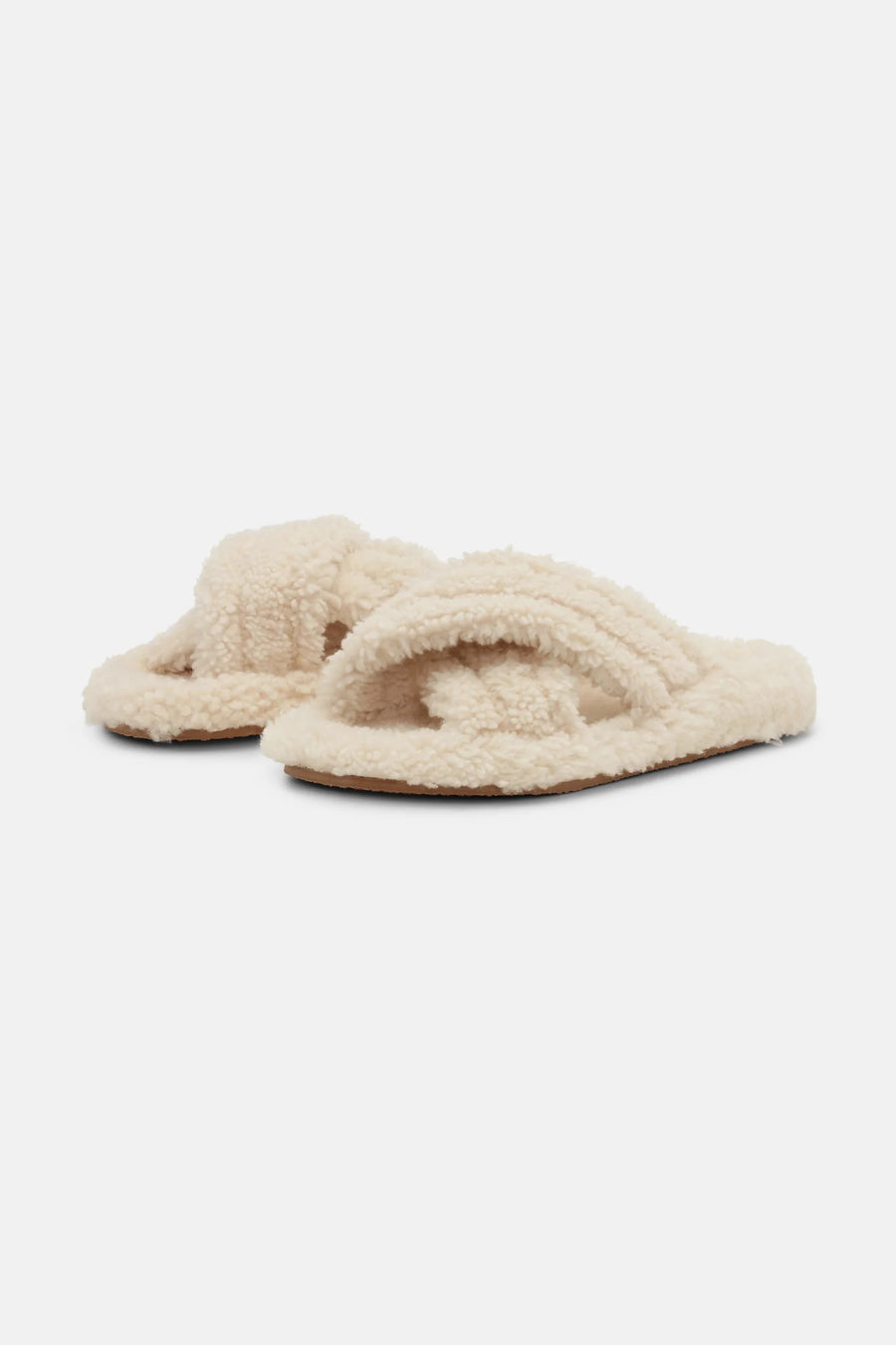 Open toe sheepskin slipper with cross over front in cream colourway. 
