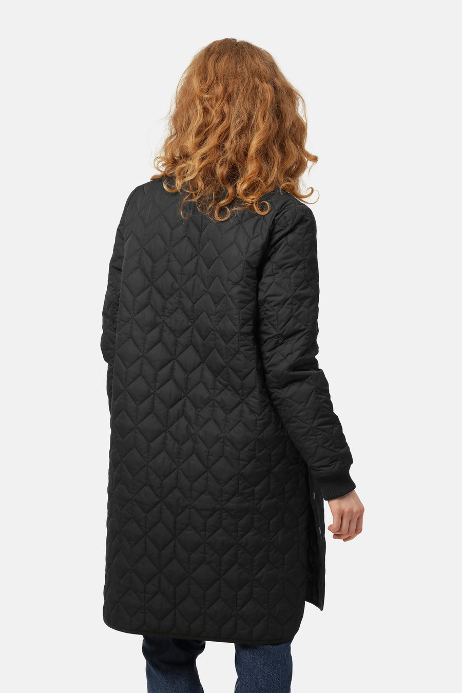 Black quilted jacket with front zip and mock neck. 