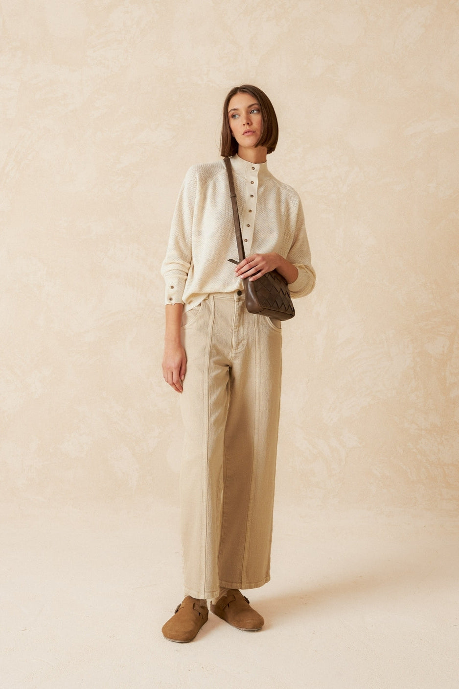 Cream knit long sleeve jumper with Perkins collar and raglan sleeve. 