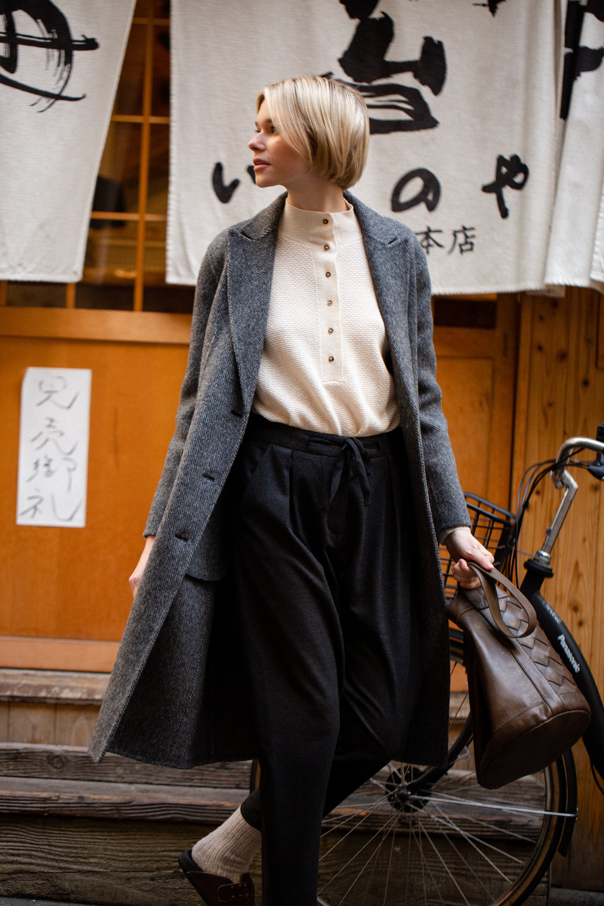 Cream knit long sleeve jumper with Perkins collar and raglan sleeve. 