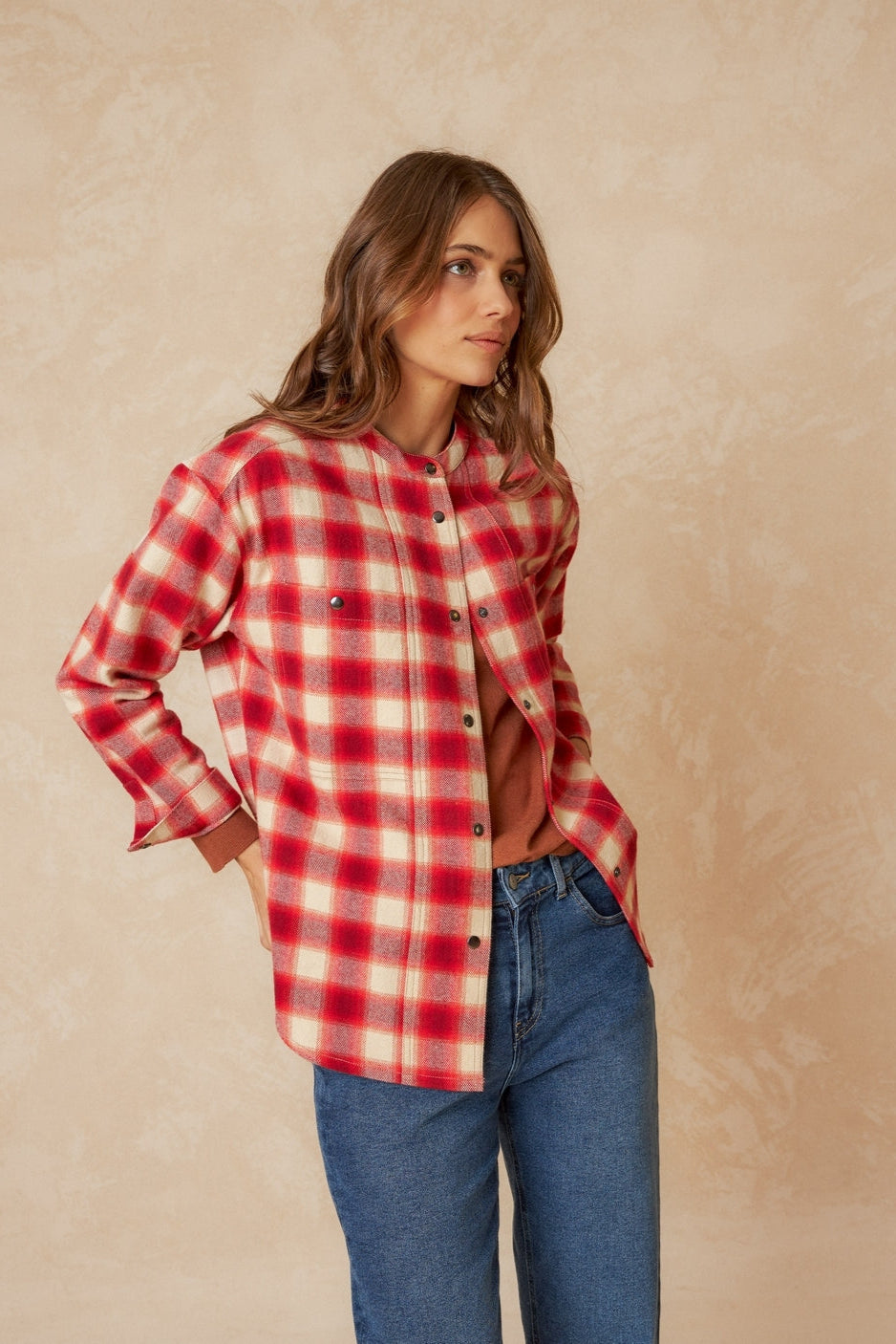 Red and white checkered over shirt with strip collar and square cut. 