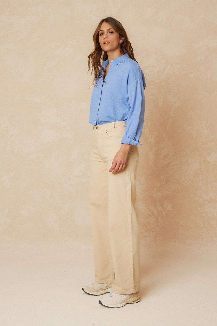 Blue Cotton Shirt with classic collar and dropped shoulder. White buttons and wide sleeves. 
