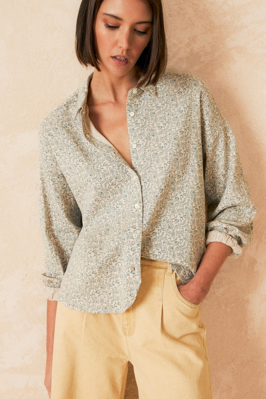 Organic Cotton Long sleeve shirt with beige base and delicate floral print. 