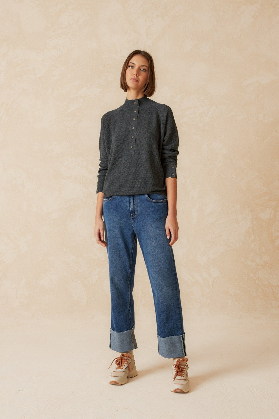 Grey knit long sleeve jumper with Perkins collar and raglan sleeve. 