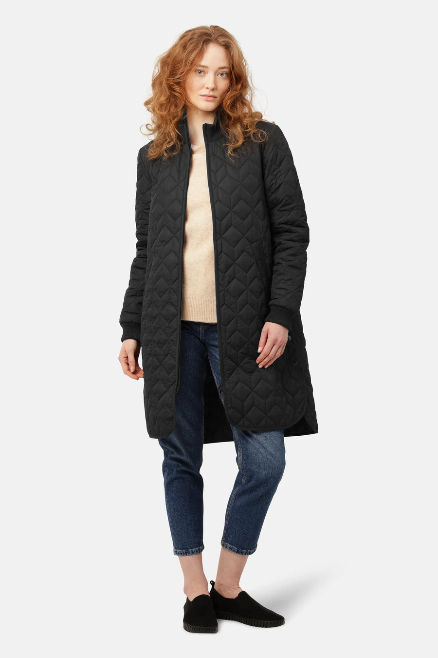 Black quilted knee length coat with mock collar. 
