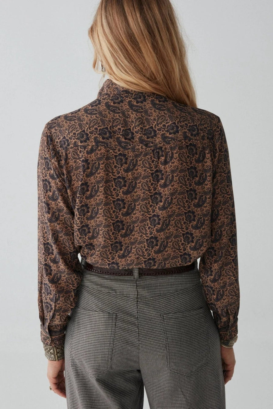 Long sleeve shirt with black and tan all over paisley print. 