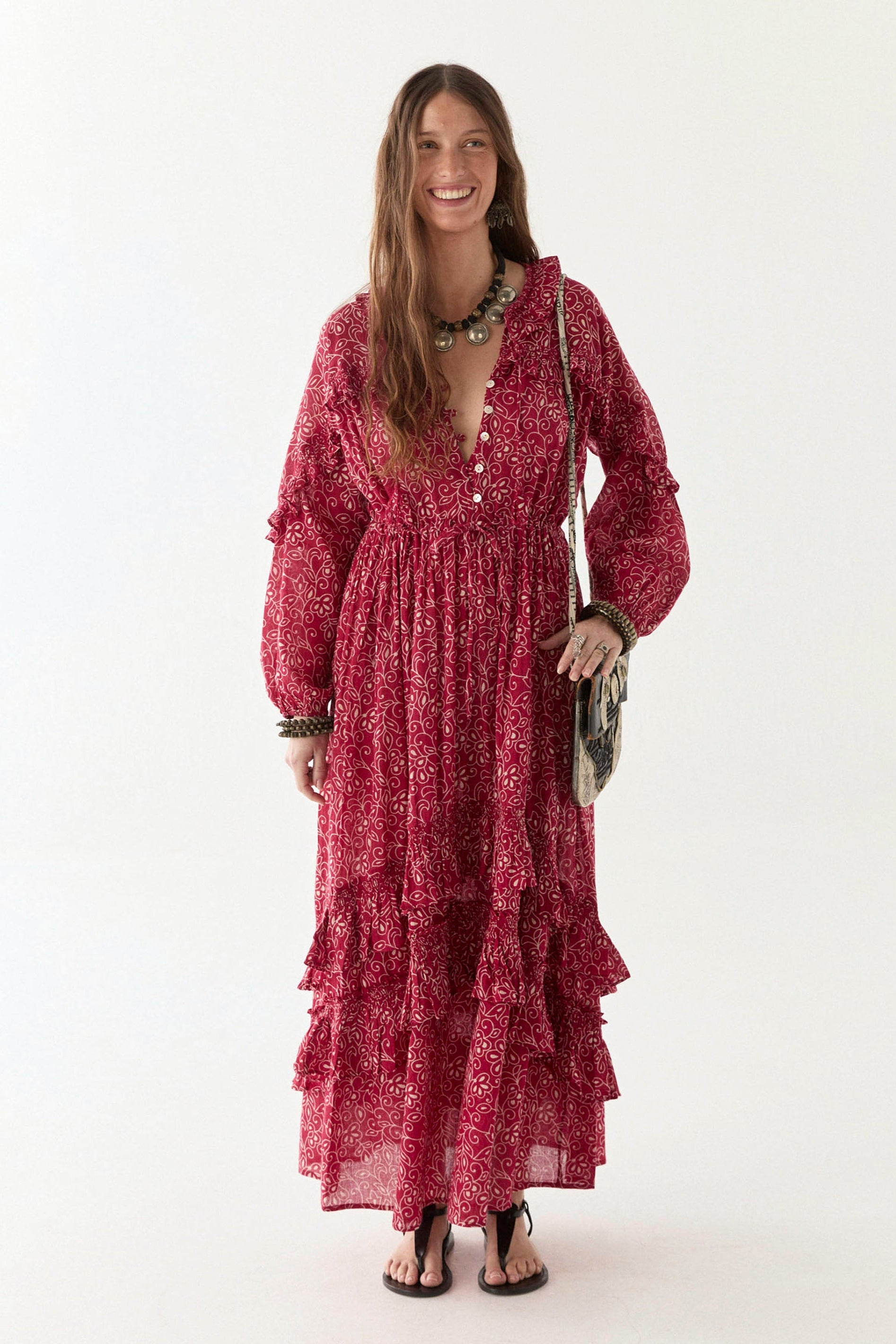 Chill red and ivory floral print floaty maxi dress worn by model on a white background. 
