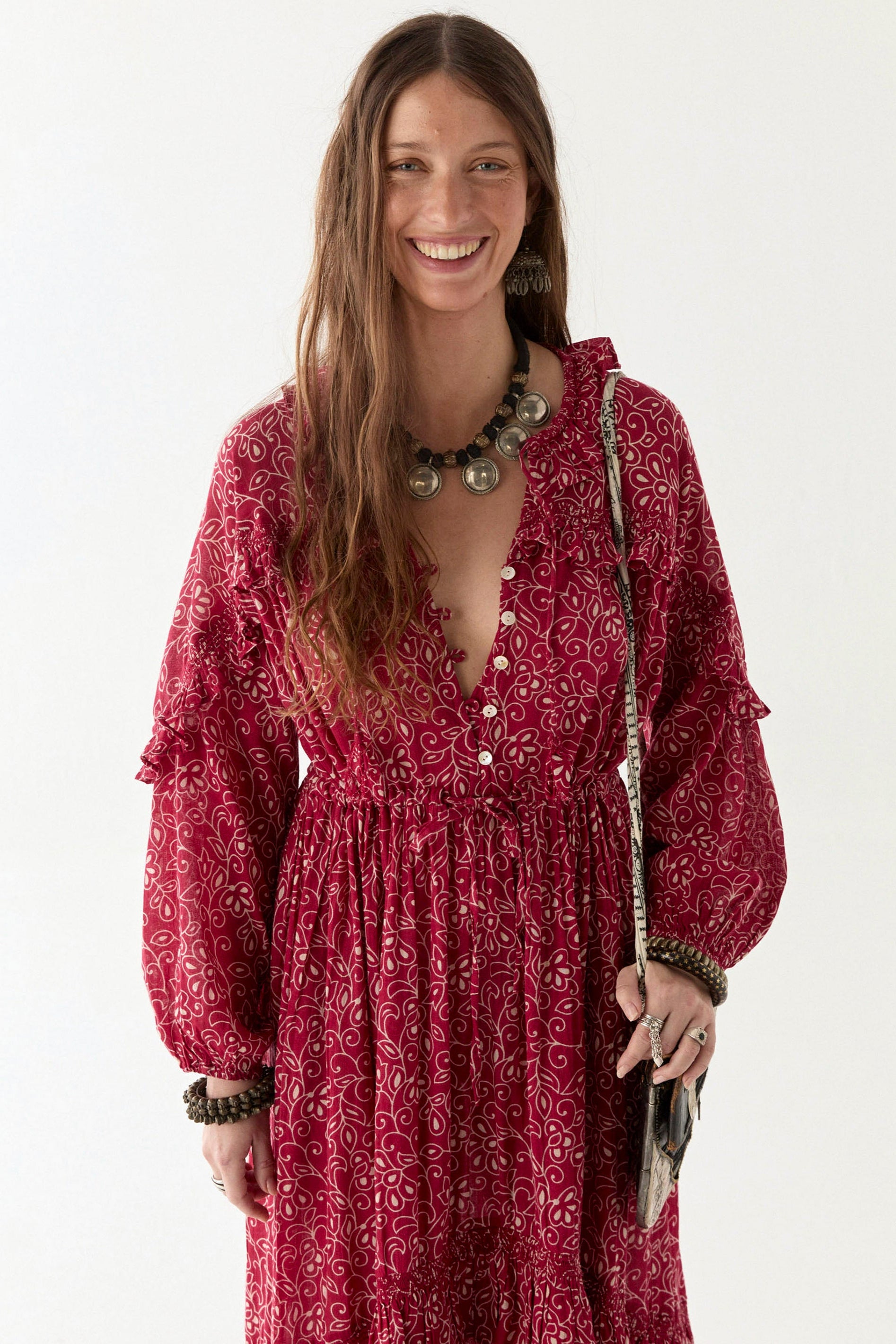 Chill red and ivory floral print floaty maxi dress worn by model on a white background. 