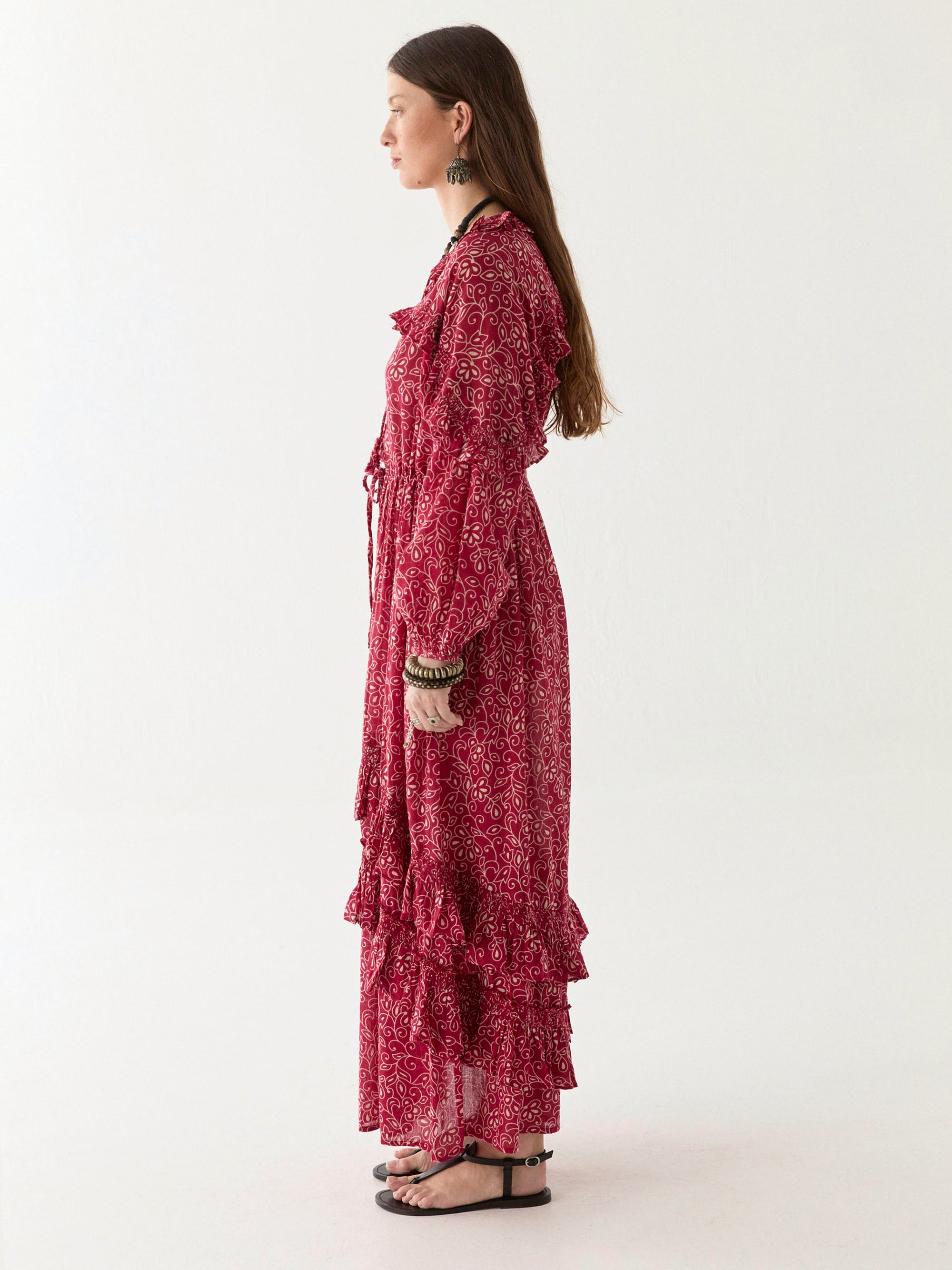 Chill red and ivory floral print floaty maxi dress worn by model on a white background. 