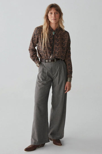 Long sleeve shirt with black and tan all over paisley print. 