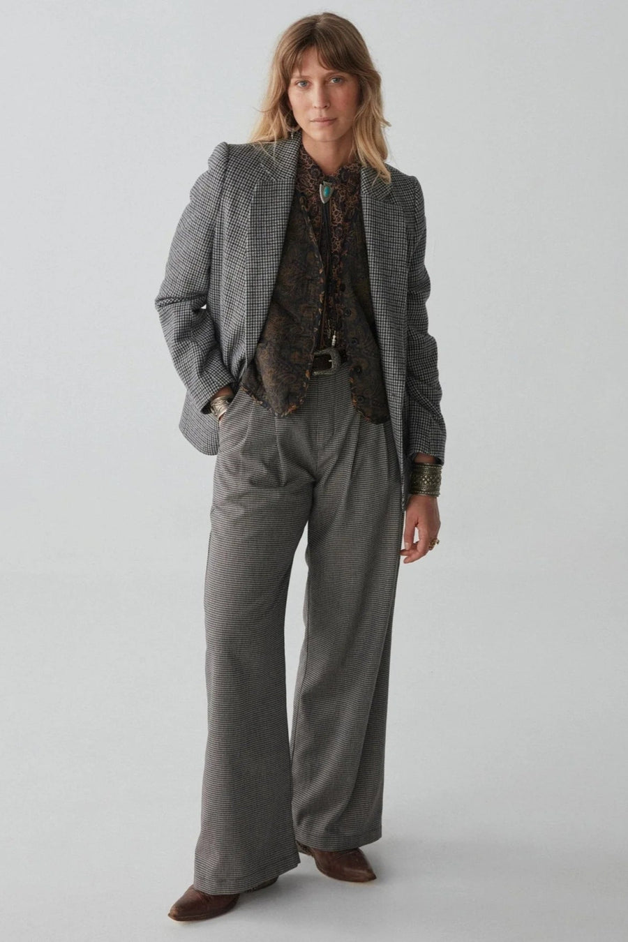 Long sleeve shirt with black and tan all over paisley print. 