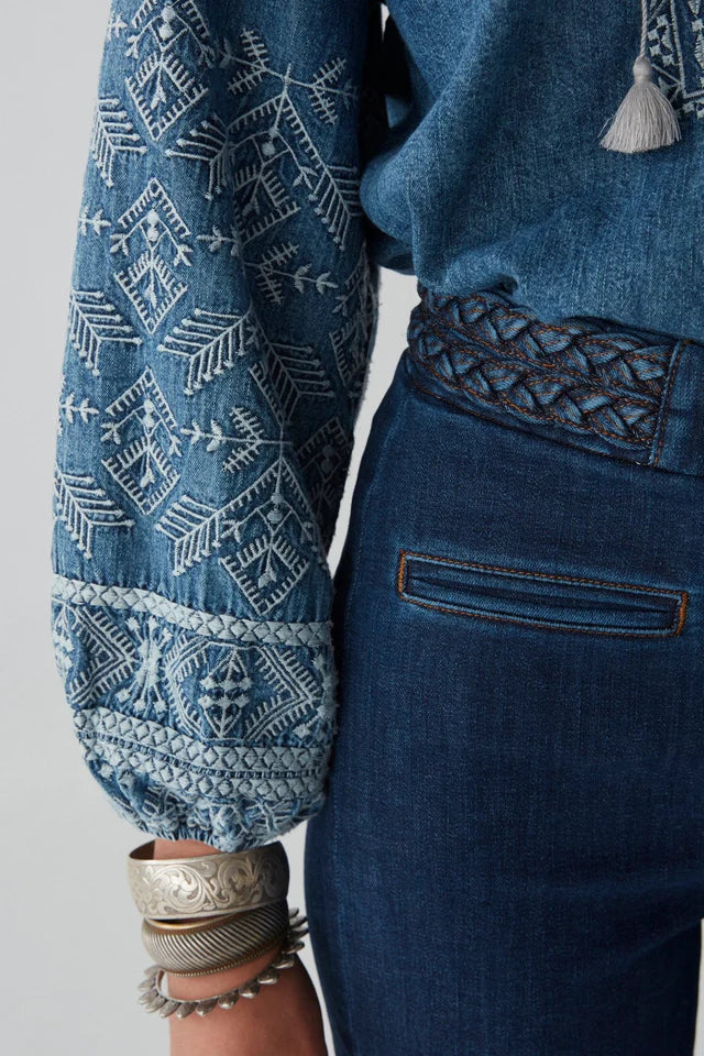 Long denim pants with braided waist detail 