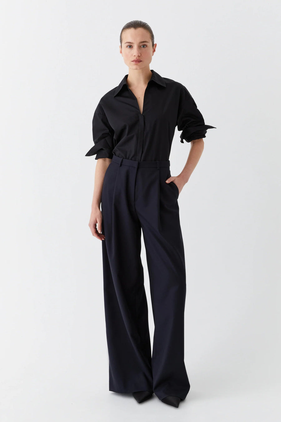 Black cotton sateen long sleeve shirt with v neck. 