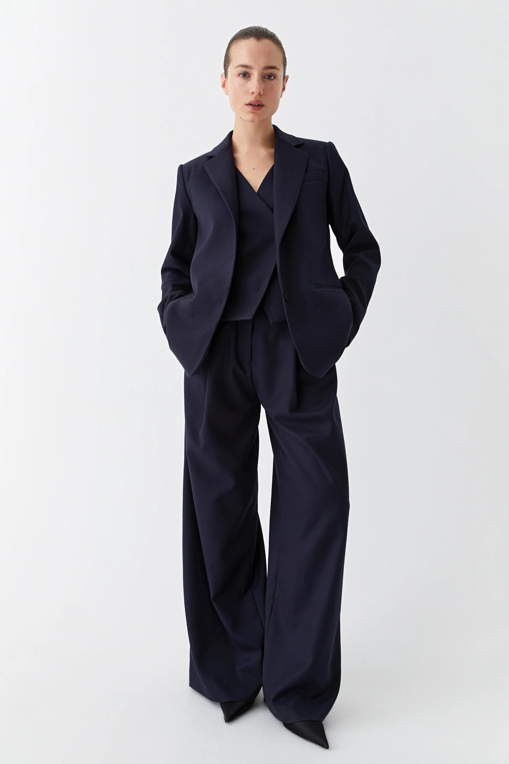 Wide leg full length trouser in Navy with front pleat.  