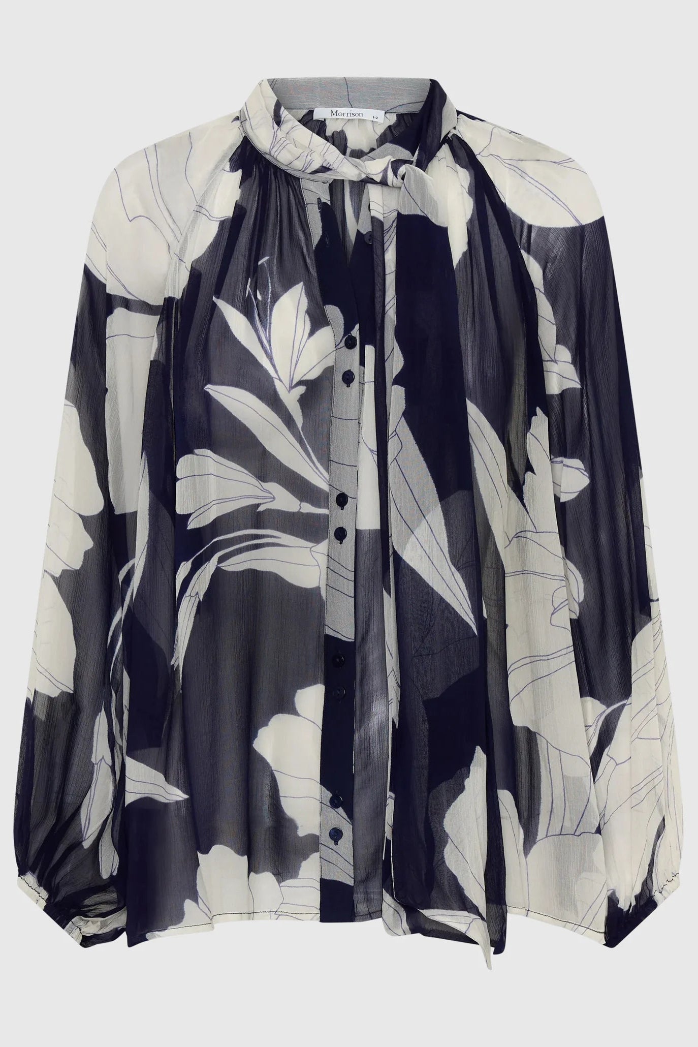 Navy and white floral patterned blouse on a white background