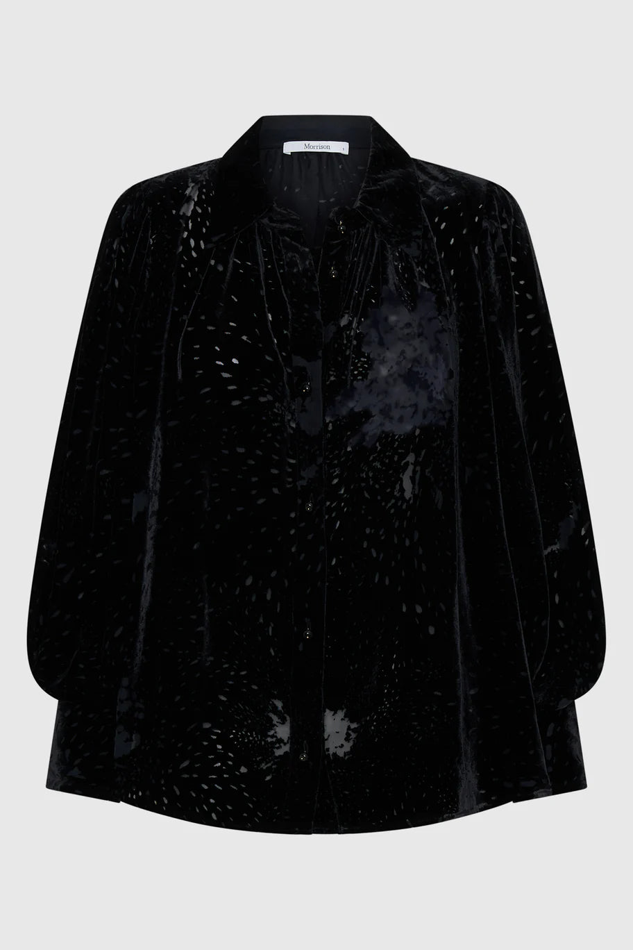 Black Velvet shirt with beaded button detailing and billow sleeves on a white background. 