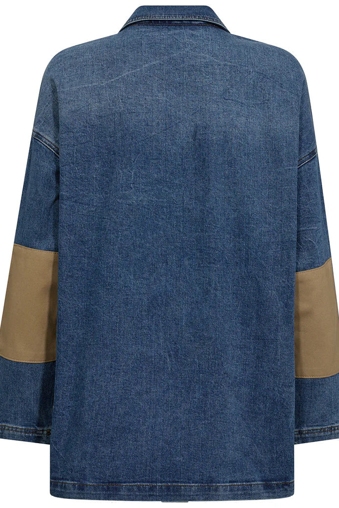 Blue denim jacket with brown arm patches on a white background