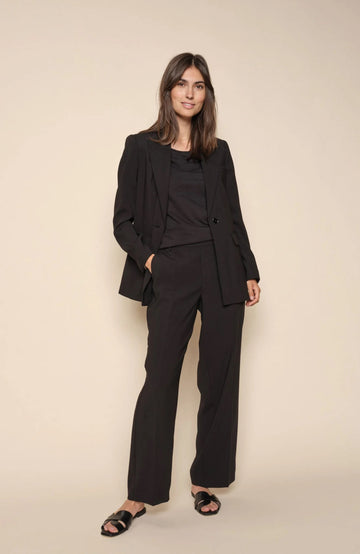 Mid rise elasticated waist and side pockets. Pressed creases. Black Pant. 