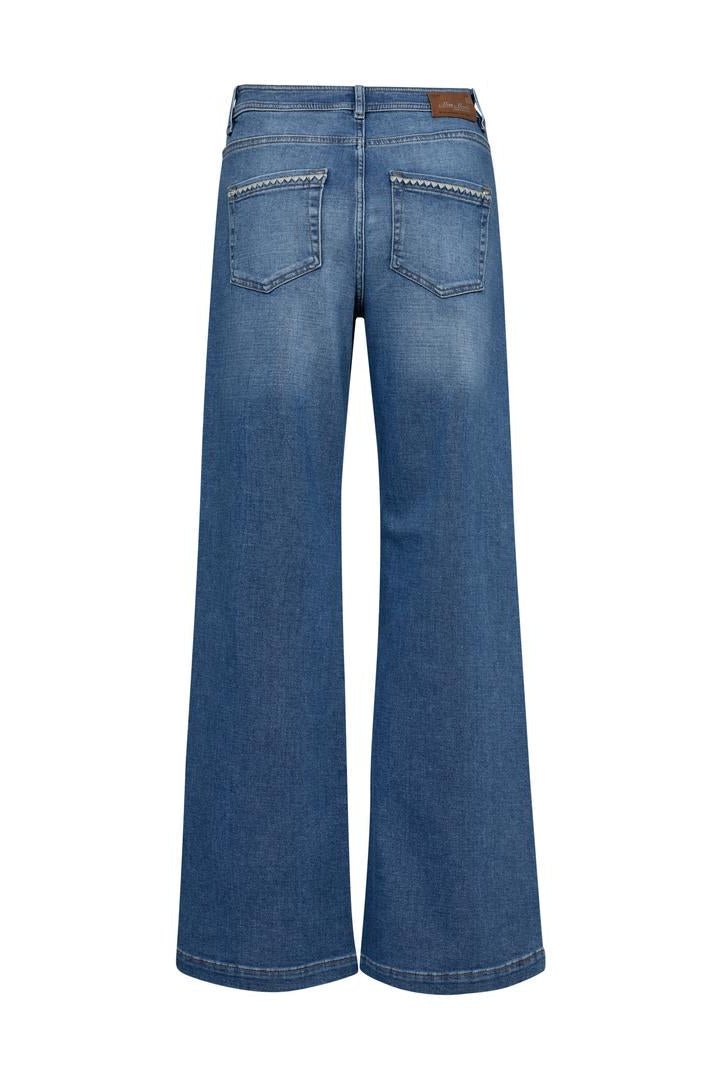 Blue jeans with pocket detailing  on a white background
