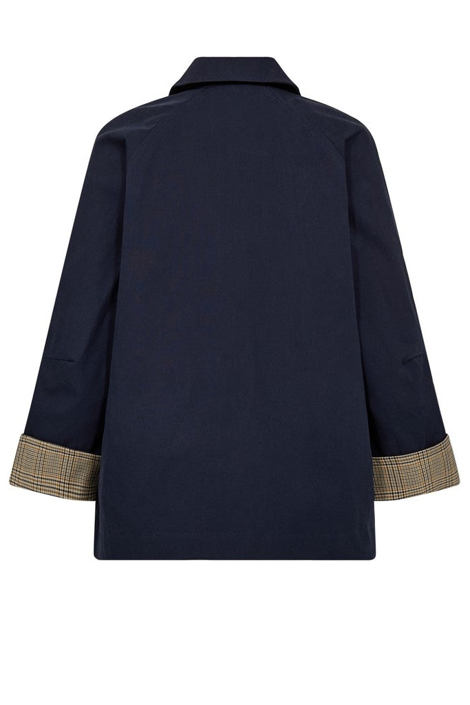 Navy blue coat shown from the back with plaid cuffs on a white background