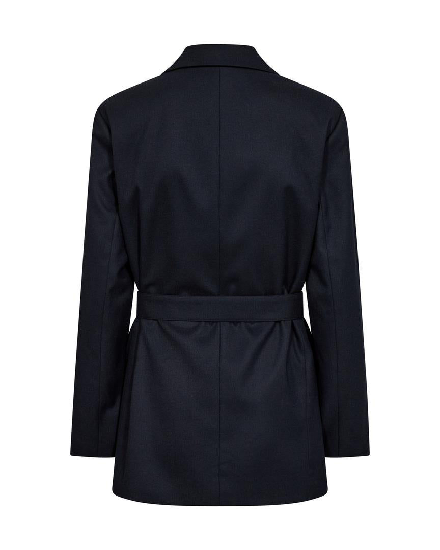 Deep Navy Blazer with double-button closure, flap pockets, and a subtle rounded hem and belt back.   