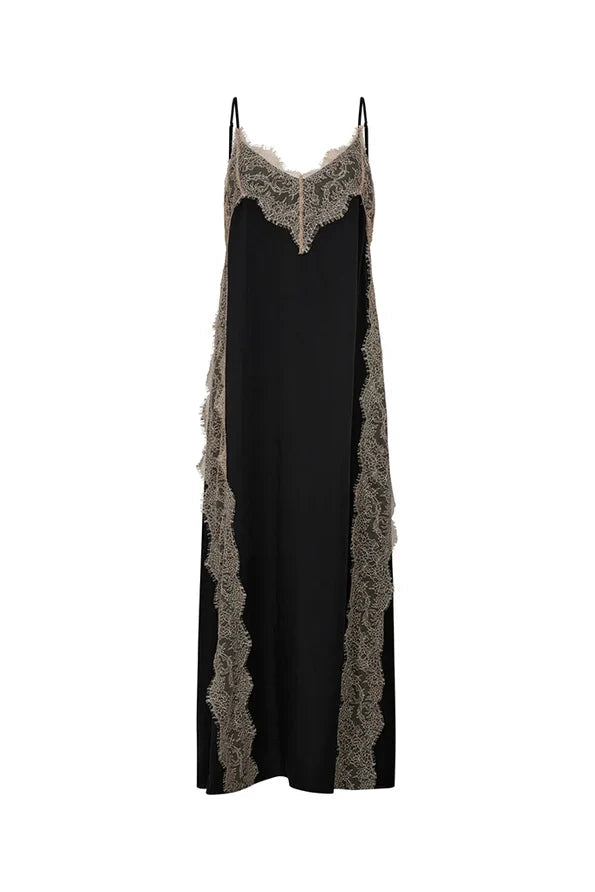 A black maxi slip dress with beige lace trim along the neckline, side panels, and thin spaghetti straps, shown against a plain white background.