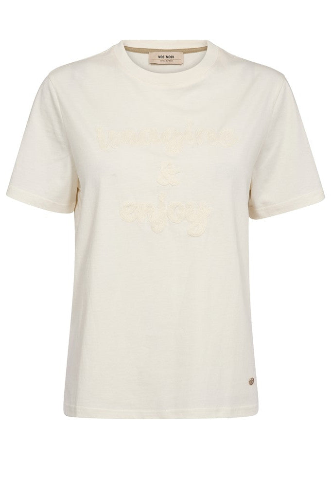 An off-white short-sleeve crewneck t-shirt with tonal embroidered text reading 'imagine &amp; enjoy' on the front, displayed against a solid white background.