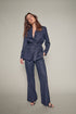 Mid rise tailored pant with slight flare in Deep Navy. 