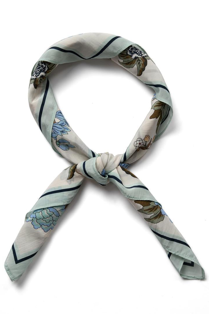 Floral square scarf with ecru base and blue brown and green floral print all over. 