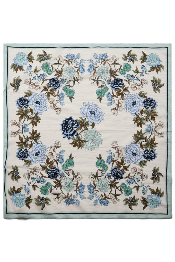 Floral square scarf with ecru base and blue brown and green floral print all over. 