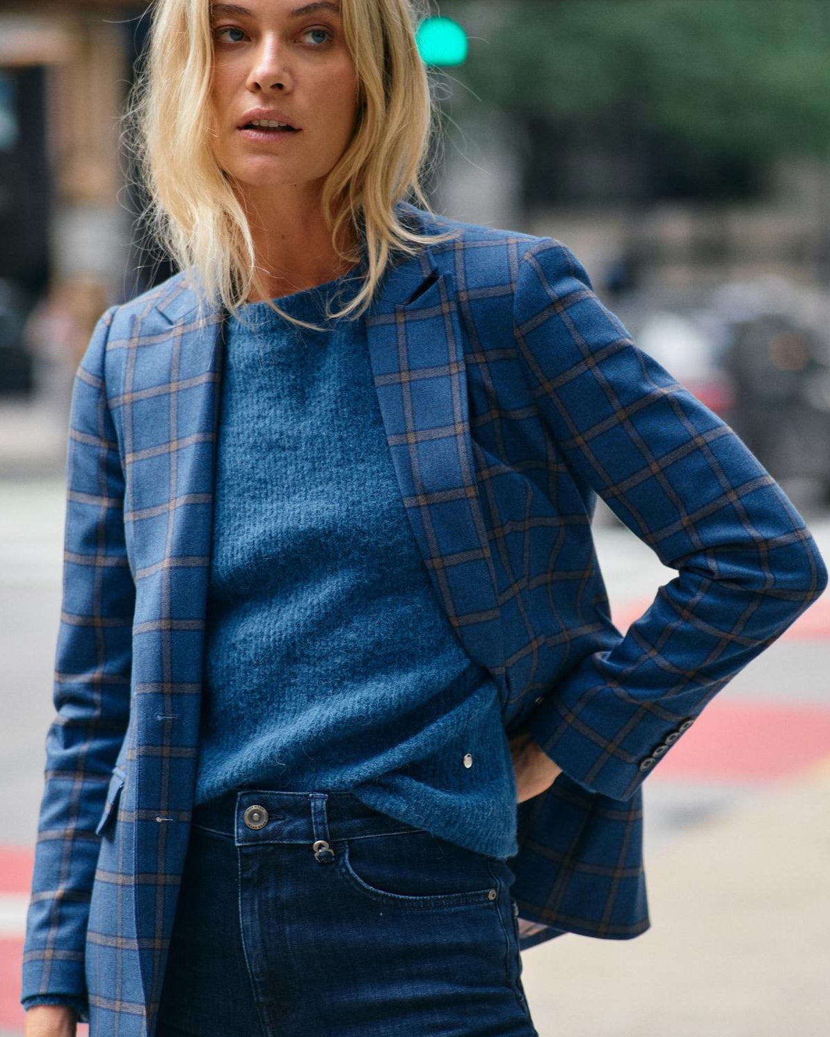 Soft wool round neck sweater in blue colourway.