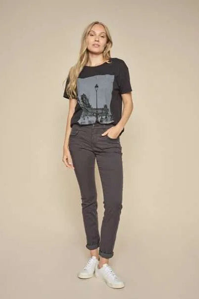 Black tapered jean with skinny leg and embellished pocket details. 