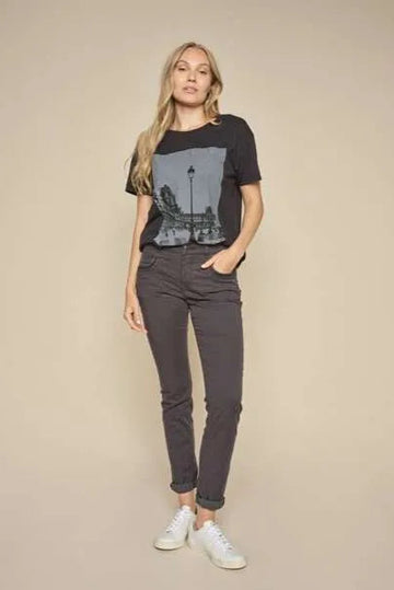 Black tapered jean with skinny leg and embellished pocket details. 