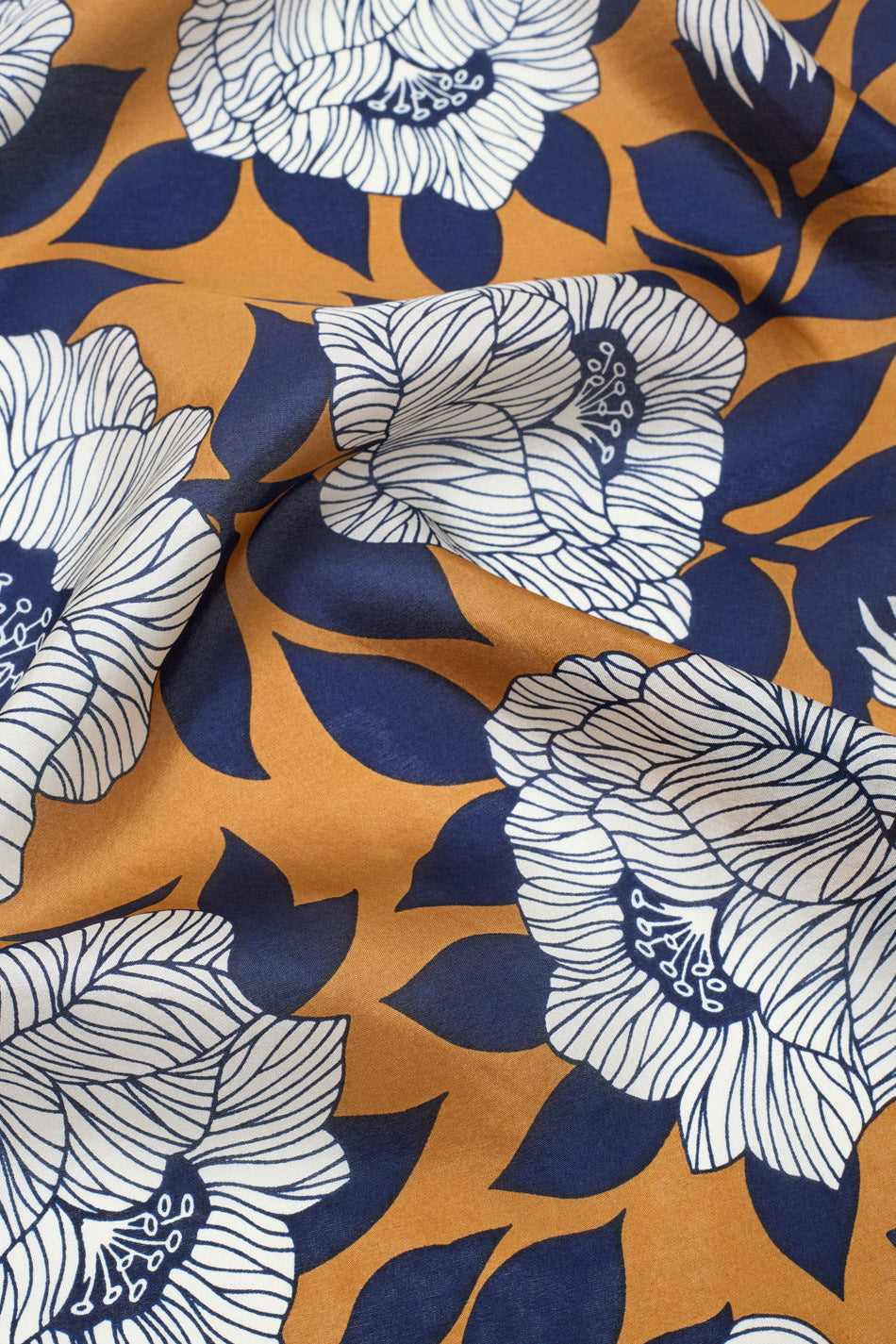 Floral pattern silk scarf with white flowers on a brown background