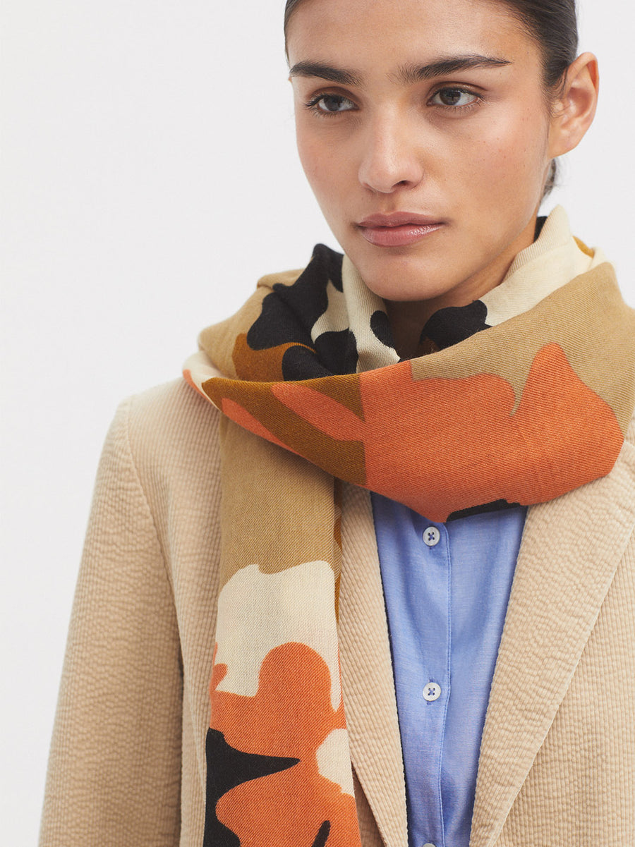 Shawl with Ecru base and all over floral print in navy orange and tan. 
