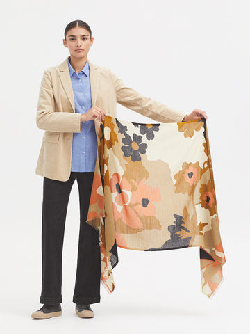Shawl with Ecru base and all over floral print in navy orange and tan. 
