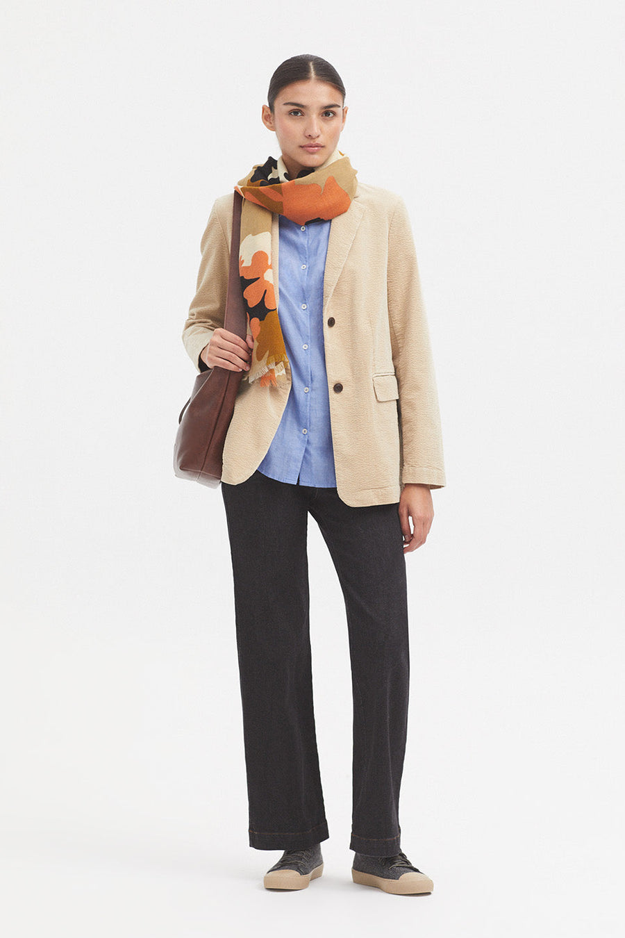 Shawl with Ecru base and all over floral print in navy orange and tan. 