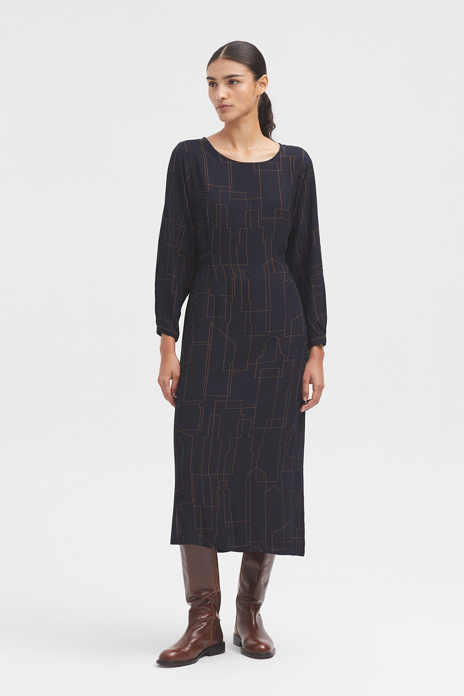 Long Sleeve Navy dress with all over print and waist tie. 