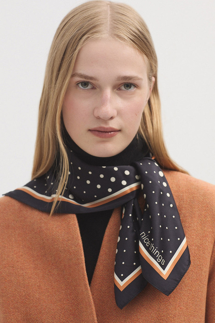 Square scarf with black base and beige dot  pattern 