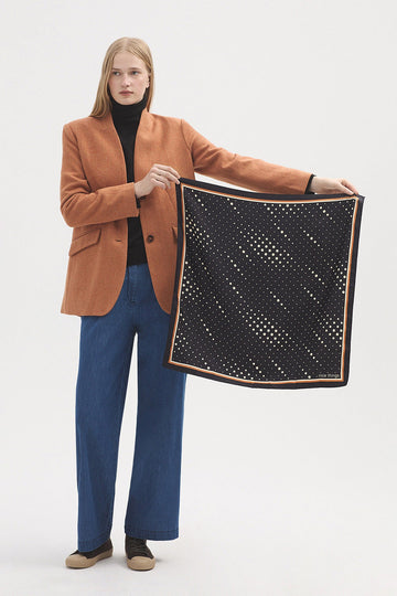 Square scarf with black base and beige dot  pattern 