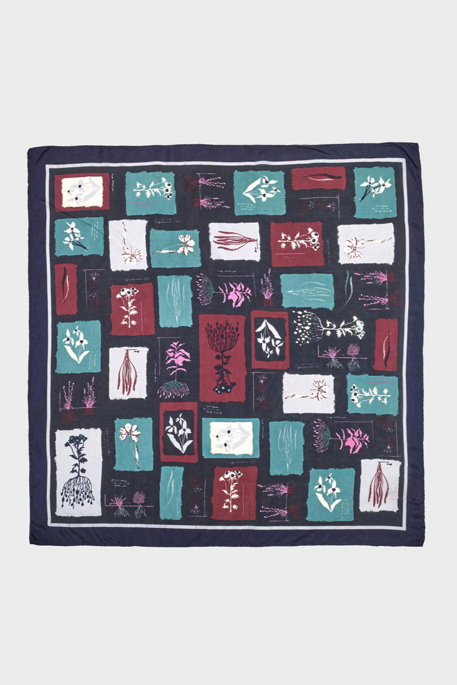 Colorful silk scarf with allover floral print. 